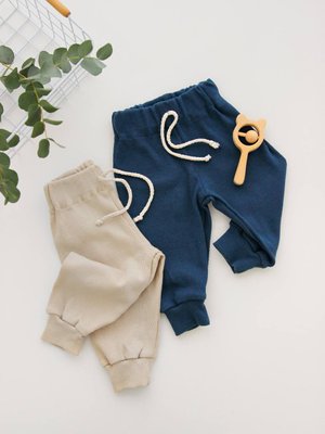 Трикотажні дитячі спортивні штани в рубчик від 0 до 24 місяців беж trousers020_56 фото